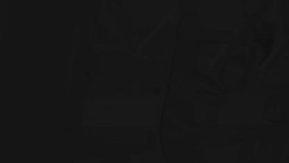 Andromeda Greek Leather Sandal – White braided version – single sandal hanging/displayed, showing braided front strap and white leather details