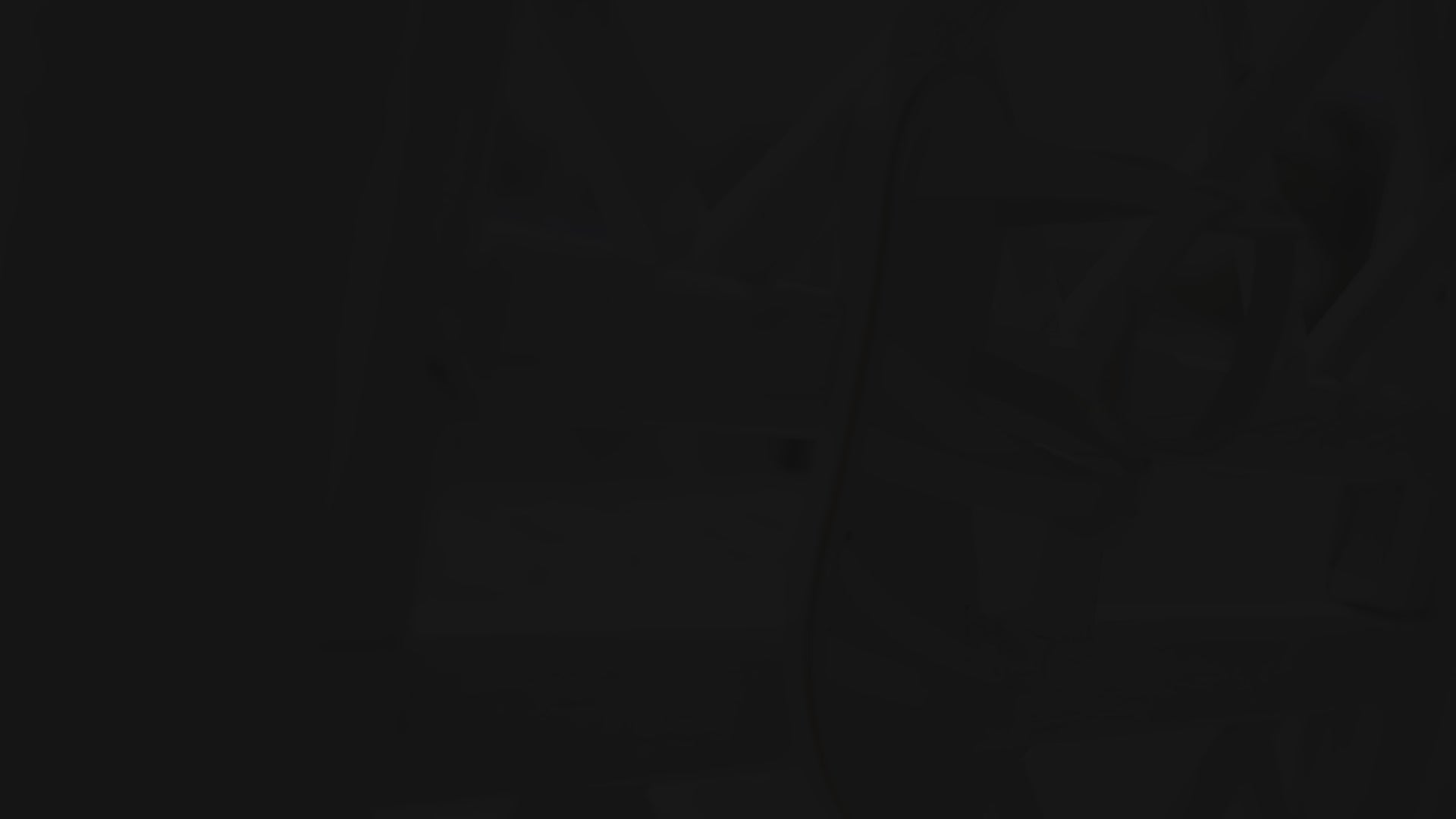 Andromeda Greek Leather Sandal – White braided version – single sandal hanging/displayed, showing braided front strap and white leather details